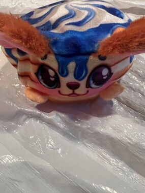 Cute Plush Animal Head with Blue Drip Design